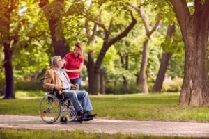 Wheelchair Assisted Person Enjoying Day Out